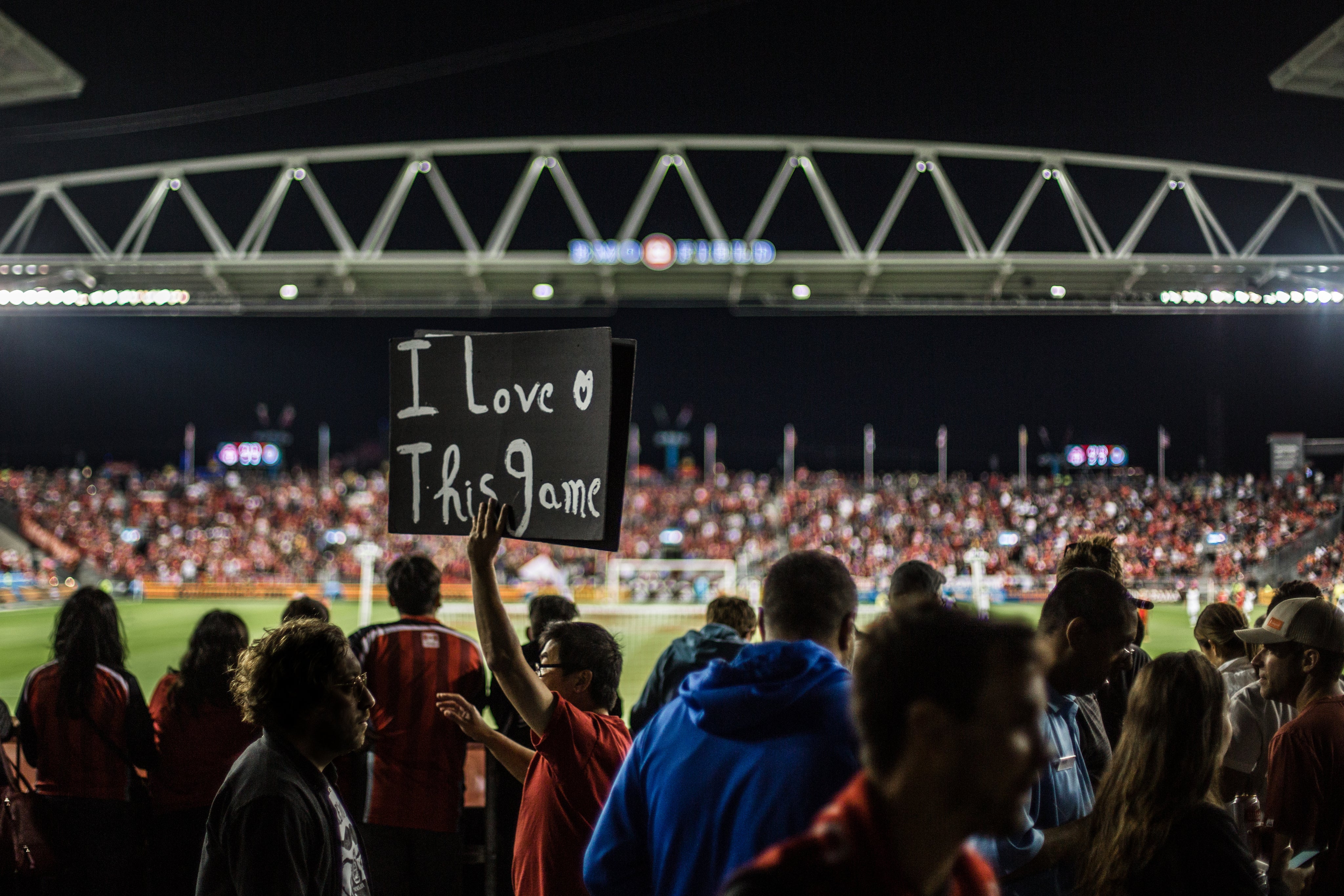 Fan-With-Sign-At-Soccer-Game.jpg